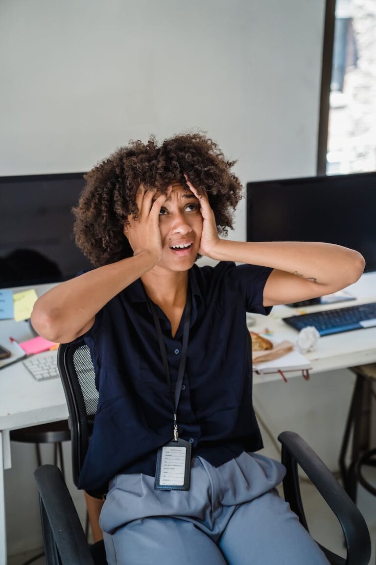 stressed and frustrated PhD mother in an office